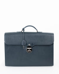 Origrand Lock Briefcase in slate blue leather with circular turn-lock and key